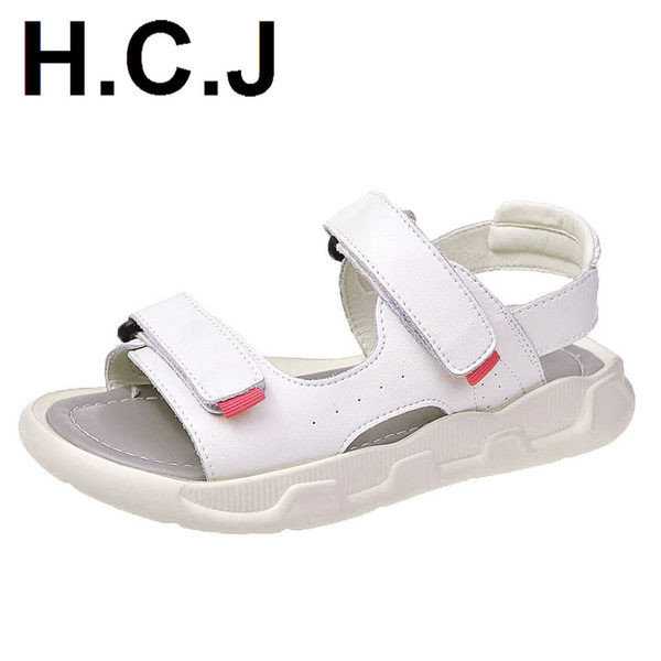 Jauns sieviešu sandaļu modelis ar velcro aizdari baltā krāsā