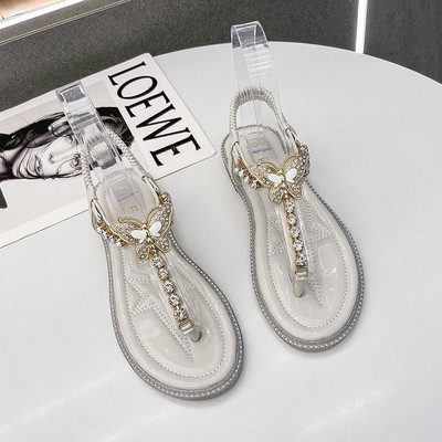 Γυναικεία σανδάλια με διακοσμητικές πέτρες και επίπεδη σόλα - δύο χρώματα