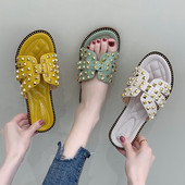 Papuci moderni de dama cu talpa plate si carouri metalice