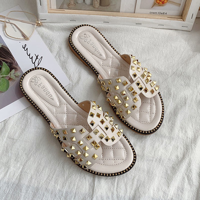 Papuci moderni de dama cu talpa plate si carouri metalice