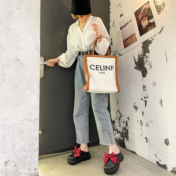 Sieviešu gumijas čības ar lenti baltā un melnā krāsā