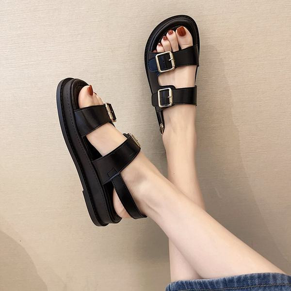 Γυναικείες παντόφλες από faux δέρμα σε μαύρο και άσπρο χρώμα