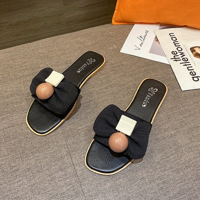 Γυναικείες παντόφλες casual με επίπεδη σόλα και κορδέλα