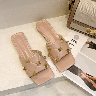 Γυναικείες έκο δερμάτινες παντόφλες με τρουξ και επίπεδη σόλα