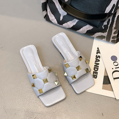 Γυναικείες έκο δερμάτινες παντόφλες με τρουξ και επίπεδη σόλα