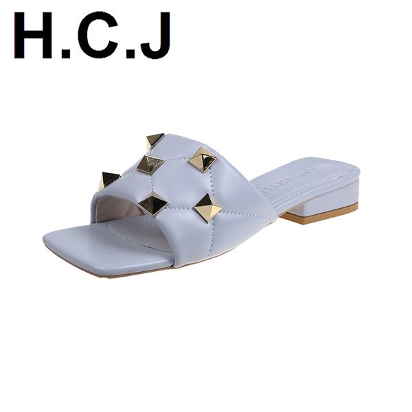 Γυναικείες έκο δερμάτινες παντόφλες με τρουξ και επίπεδη σόλα