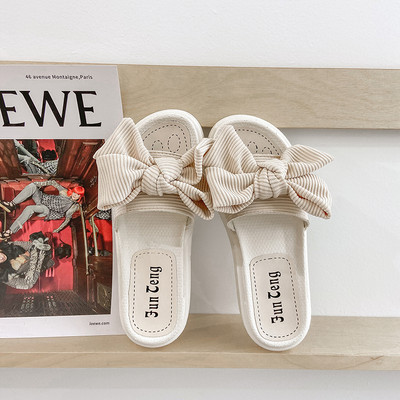 Παντόφλες για γυναίκες με επίπεδη σόλα και κορδέλα