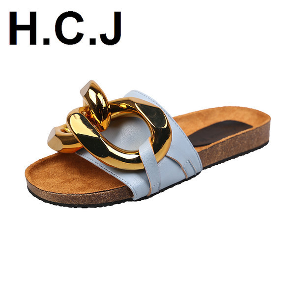 Γυναικείες παντόφλες με μεταλλικό στοιχείο και επίπεδη σόλα