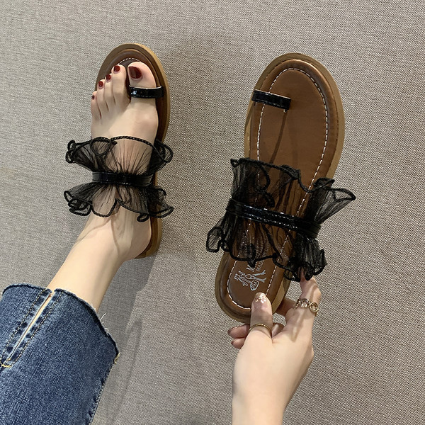 Μοντέρνα παντόφλες με επίπεδη σόλα  για γυναίκες