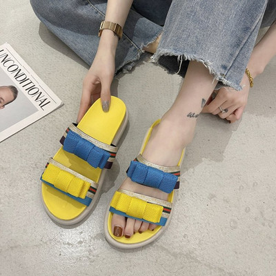 Γυναικείες παντόφλες με επίπεδη σόλα και κορδέλες σε διάφορα χρώματα