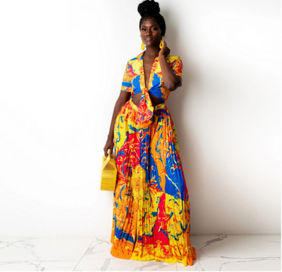 Set elegant de damă, cu fustă lungă plisată și bustieră