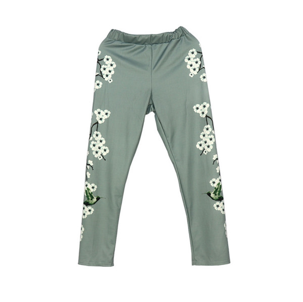 Sieviešu komplekts ar ziedu rakstu bikses un blūze