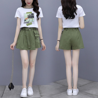 Moderan ženski komplet od dva dijela suknja-hlače i majica