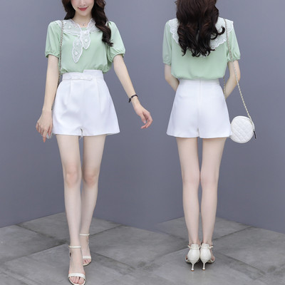 Moderns sieviešu komplekts no divdaļīgas blūzes un šortiem