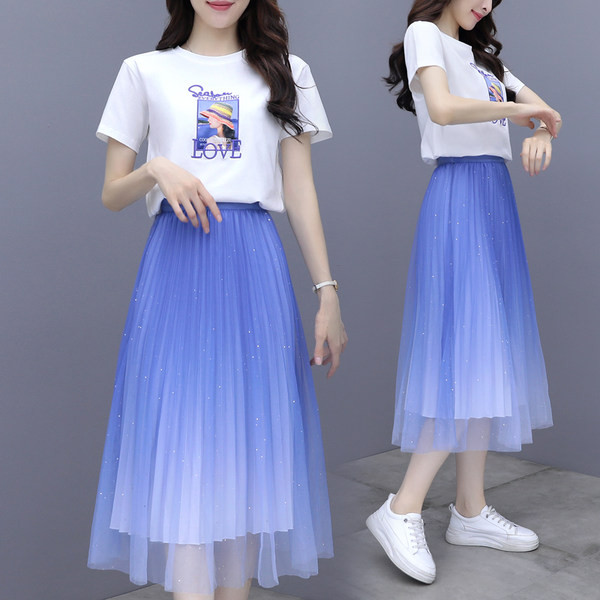 Novi model ženskog kompleta iz dva dijela majice s printom i suknje