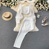 Elegantni ženski kompleti u bijeloj i crnoj boji