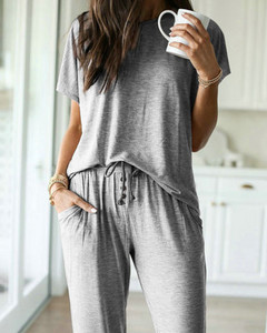 Ikdienas sieviešu bikšu komplekts ar pogām un blūzi