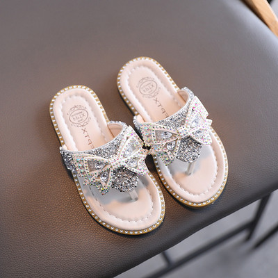 Naujas vaikiškų šlepečių modelis su kaspinu ir akmenukais