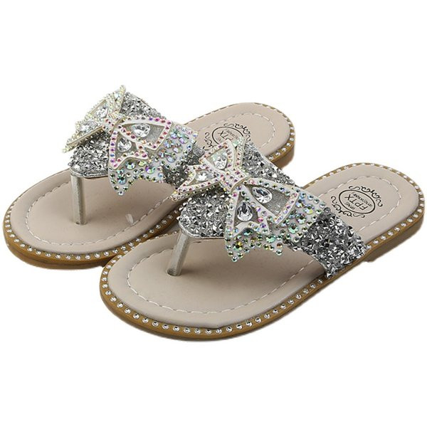 Naujas vaikiškų šlepečių modelis su kaspinu ir akmenukais