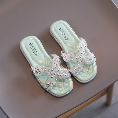 Šiuolaikinės vaikiškos šlepetės su akmenukais ir lygiu padu