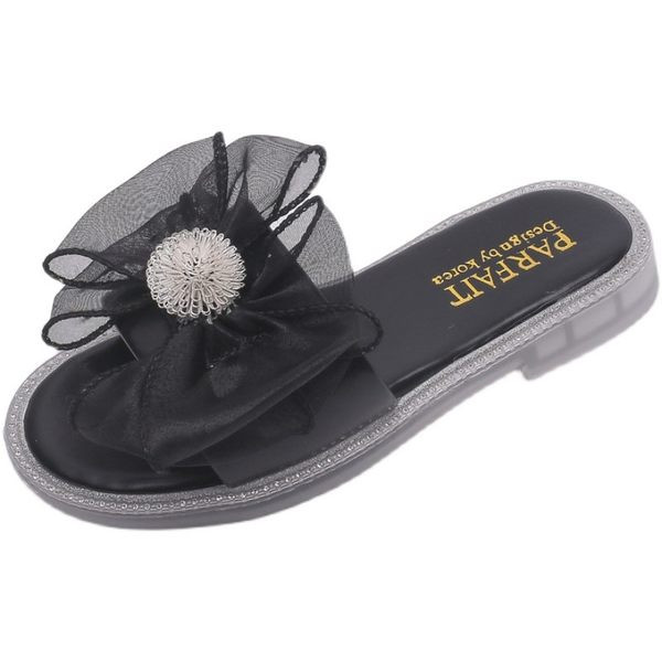 Moderne dječje papuče s trakom i ravnim potplatom