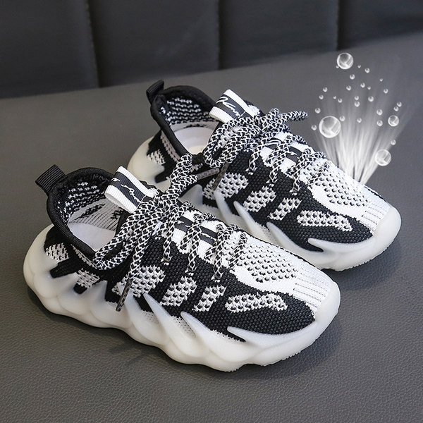 Textilből készült, lapos talpú gyerekcipő lányoknak és fiúknak