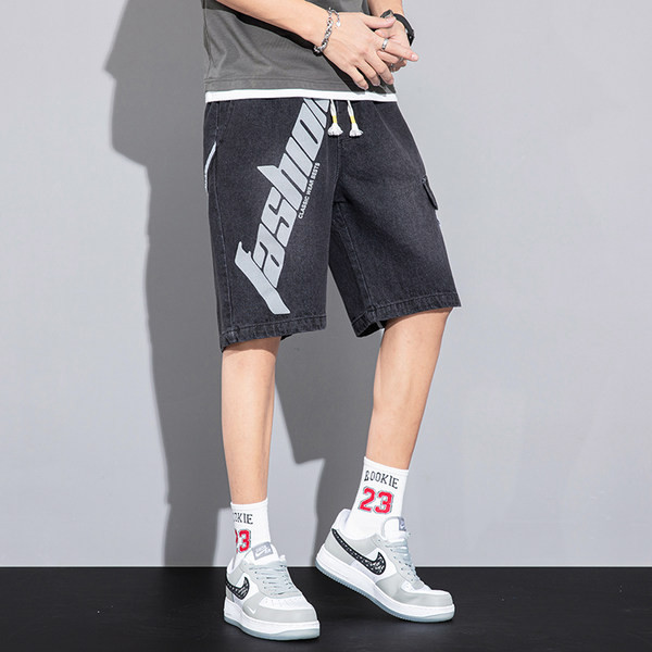 Teksapüksid elastse vöökoha ja kirjaga