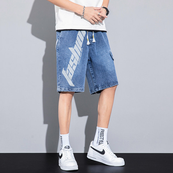 Teksapüksid elastse vöökoha ja kirjaga