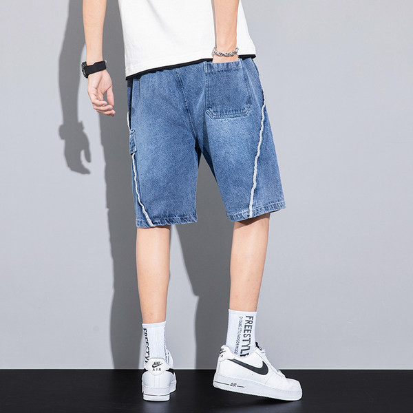 Teksapüksid elastse vöökoha ja kirjaga