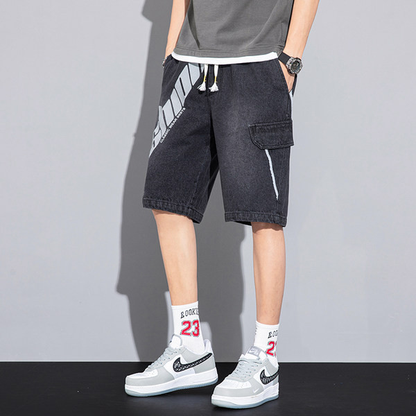 Teksapüksid elastse vöökoha ja kirjaga