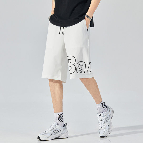 Térdig érő pamut rövidnadrág felirattal