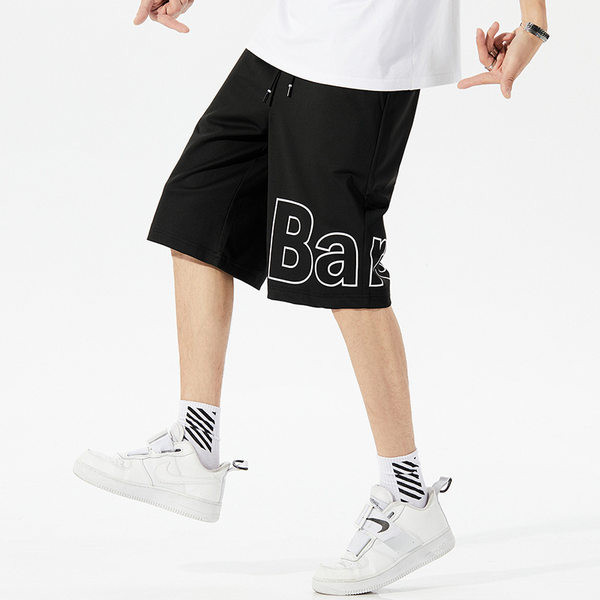 Térdig érő pamut rövidnadrág felirattal