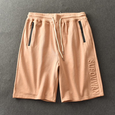 Férfi rövidnadrág zsebekkel és nyakkendőkkel