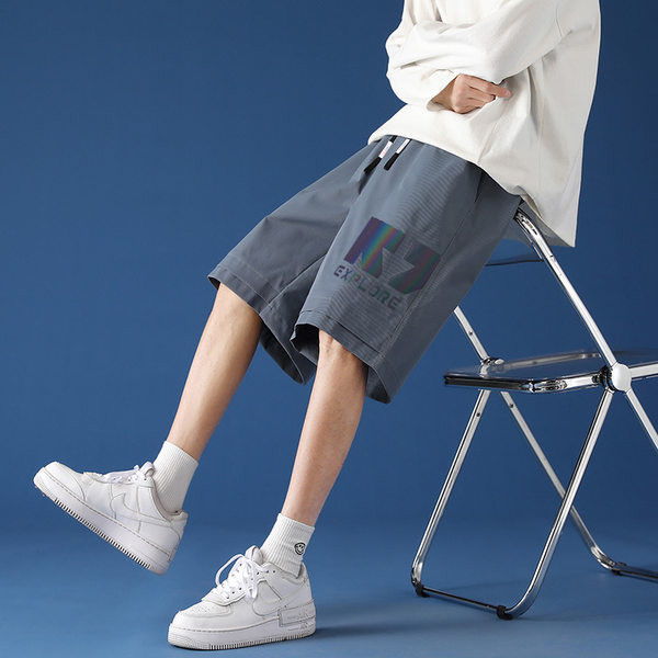 Lezser széles férfi nadrág felirattal