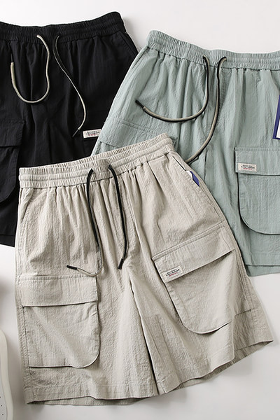 Férfi nadrág 3/4 hosszban és zsebekkel