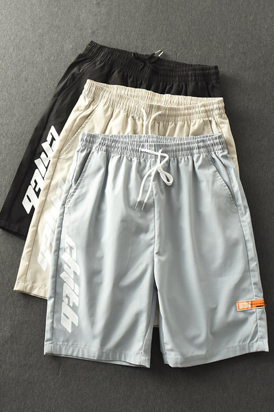 Férfi rövidnadrág gumírozott derékkal, felirattal