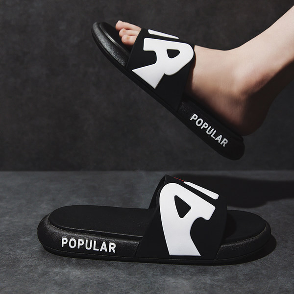 Vīriešu čības ar biezu zoli un uzrakstu