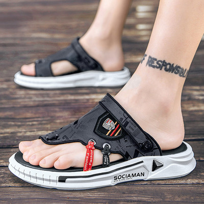 Vīriešu čības ar emblēmu un krāsainām saitēm