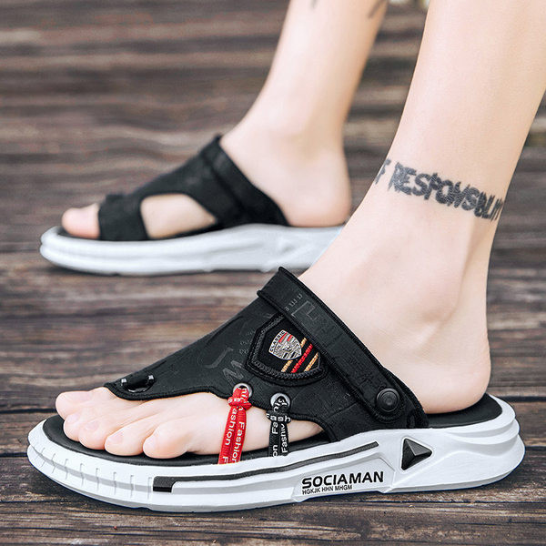 Vīriešu čības ar emblēmu un krāsainām saitēm