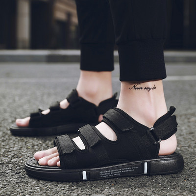 Férfi textil szandál tépőzárral és felirattal a talpán