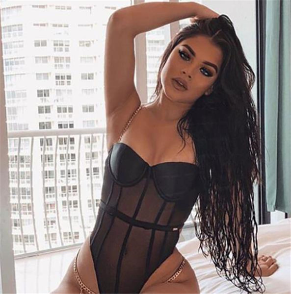 Sieviešu bodijs ar metāla lencēm un caurspīdīgu daļu