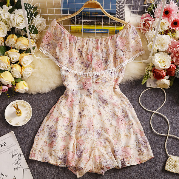 Sieviešu moderns kombinezons ar ziedu motīviem