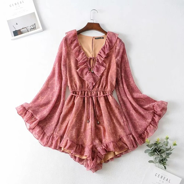 Kevad-sügis lokkidega kombinesoon