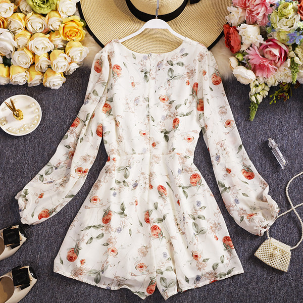 Női overall új modellje hosszú ujjal és spitz nyakkivágással