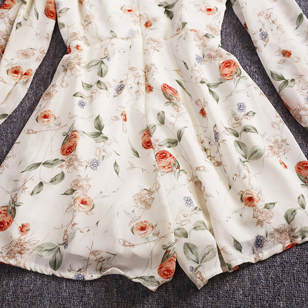 Női overall új modellje hosszú ujjal és spitz nyakkivágással