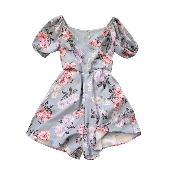 Sieviešu īss kombinezons ar ovālu kakla izgriezumu un ziedu motīviem