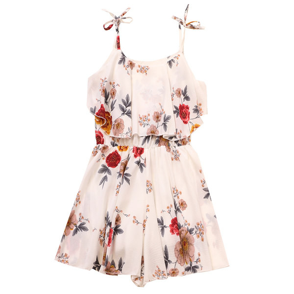 Sieviešu īss kombinezons ar plānām lencītēm un ziedu motīviem