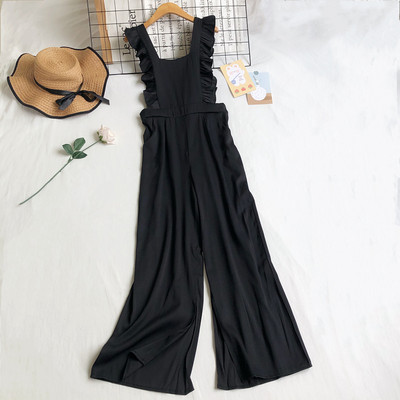 Naiste pikad lokkidega kombinesoonid