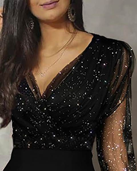 Naiste kaasaegne pikkade varrukate ja läikivate elementidega kombinesoon