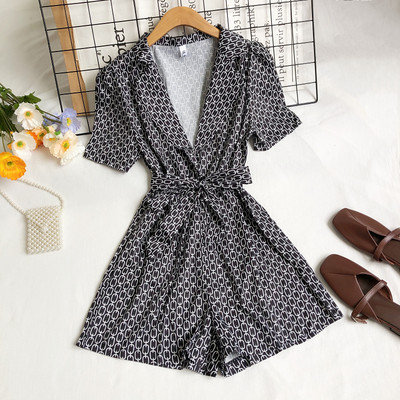 Moderns sieviešu kombinezons ar špica kakla izgriezumu divās krāsās